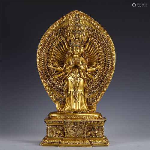 A CHINESE GILT-BRONZE MULTI-HANDS STANDING GUANYIN
