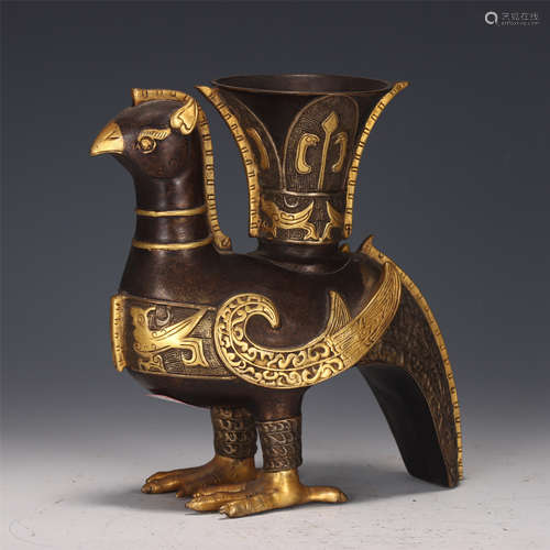 A CHINESE PARCEL GILT-BRONZE BIRD-SHAPE WINE VESSEL