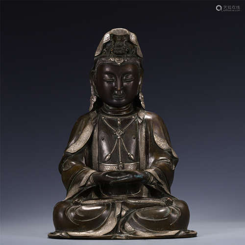 A SILVER INLAID SEATED GUANYIN