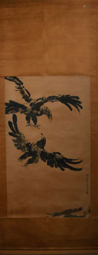 A CHINESE PAINTING OF TWO FLYING EAGLES