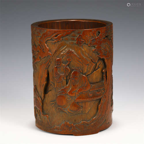 A CARVED BAMBOO FIGURAL BRUSH POT