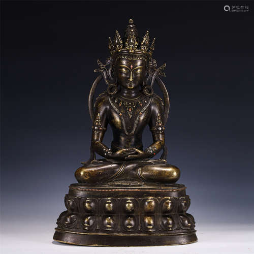 A SILVER INLAID BRONZE FIGURE OF CROWNED BUDDHA