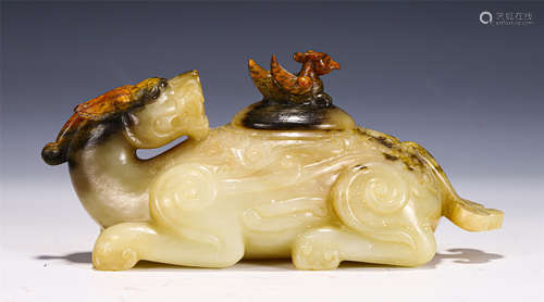 A CARVED WHTIE AND RUSET JADE BEAST WATER POT WITH COVER