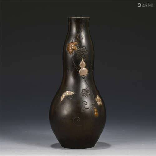 A BRONZE PARCEL GILT DOUBLE-GOURDS VASE