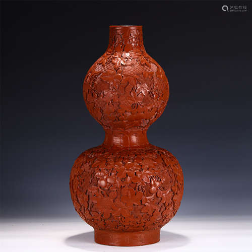 A FINE CARVED CINNABAR LACQUER DOUBLE-GOURDS VASE