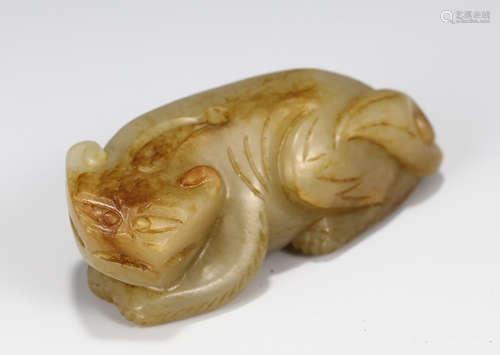 A CARVED WHITE JADE FIGURAL PENDANT