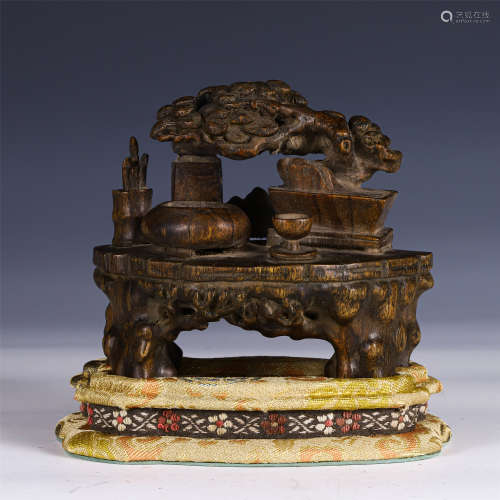 A CARVED CHENXIANG DECORATION