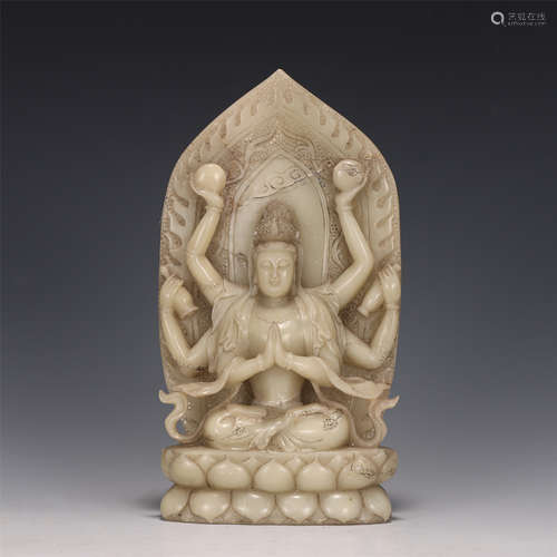 A CHINESE CARVED STONE SEATED GUANYIN