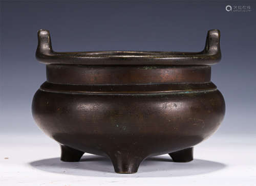 A BRONZE TRIPOD CENSER