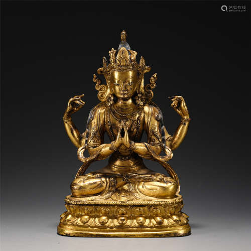 A GILT BRONZE FIGURE OF FOUR HANDS BODHISATTVA