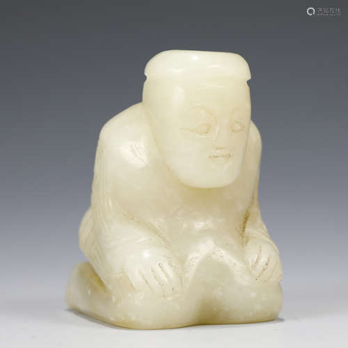 A CARVED WHITE JADE BEAST