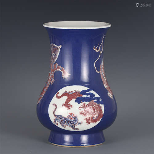 A CHINESE BLUE GROUND AND COPPER RED ZUN VASE