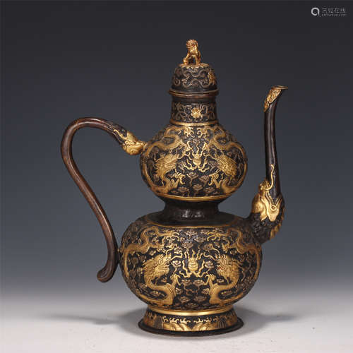 A CHINESE GILT-BRONZE DOUBLE-GOURDS EWER