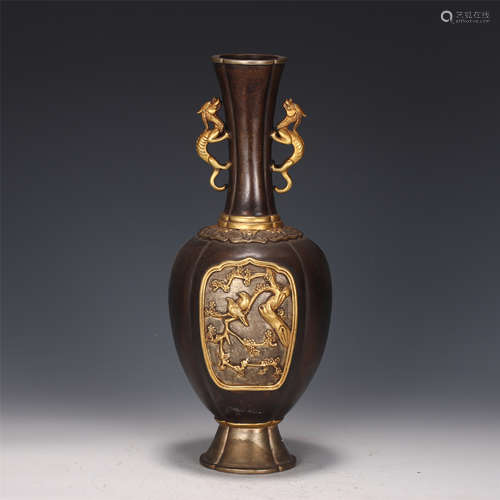 A CHINESE BRONZE PARCEL GILT DOUBLE-HANDLED VASE