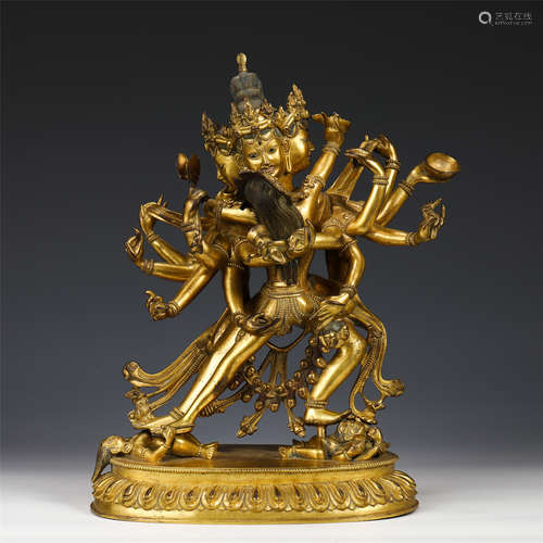 A TIBETAN GILT BRONZE FIGURE OF CAKRASAMVARA