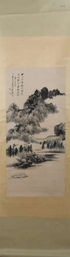 A CHINESE PAINTING OF LANDSCAPE AND FIGURES