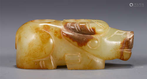 A CARVED CREAMY JADE BUFFALO