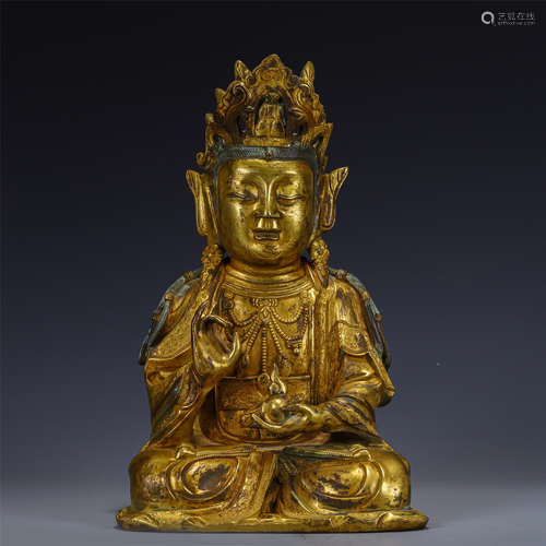 A GILT FIGURE OF GUANYIN