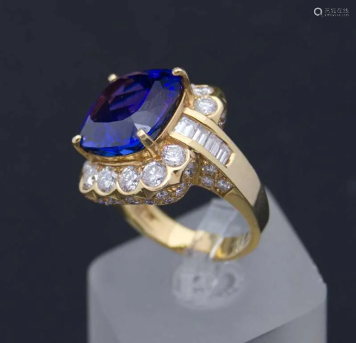 Gold ring with diamonds and tanzanite