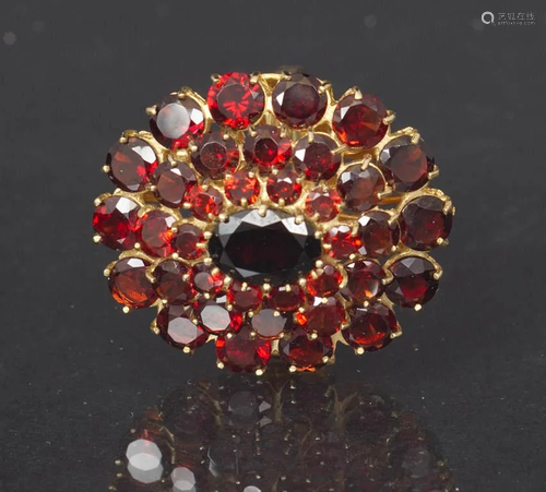 Gold ring with garnets