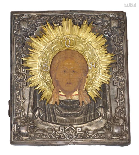 Wooden icon with a silver frame