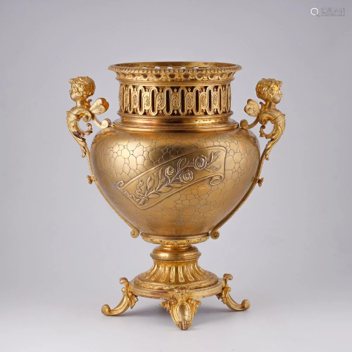 Antique gilt bronze flower pot with motifs of putti