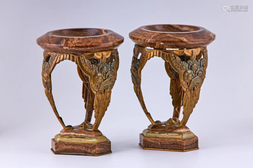 A pair of Art Deco bronze and marble decorative vases