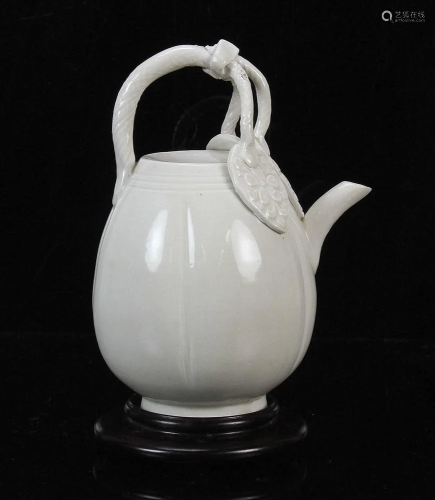 A Rare Molded Ding Type Ewer