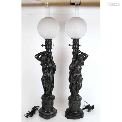 Pair of Classical Figural White Metal Lamps