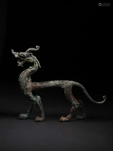 A GILT-BRONZE DRAGON ORNAMENT 