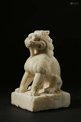 A WHITE MARBLE LION 