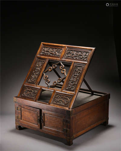 A CHINESE CARVED HARDWOOD DRESSING BOX