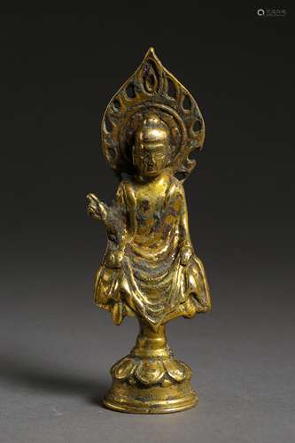 A GILT-BRONZE Sakyamuni