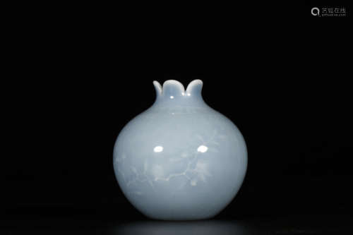 A SKY-BLUE-GLAZED AN-CARVED POMEGRANATE