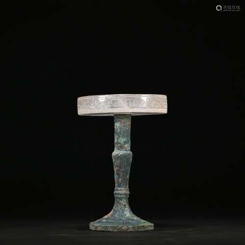A Bronze and crystal candlestick