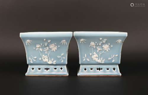 A pair of celadon-glazed flowerpot