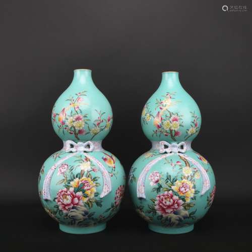 A pair of enamel 'floral and birds' gourd-shaped vase