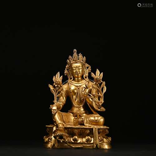 A gilt-bronze statue of Tara