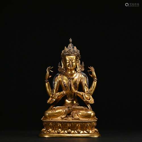 A gilt-bronze statue of Four arm Avalokitesvara