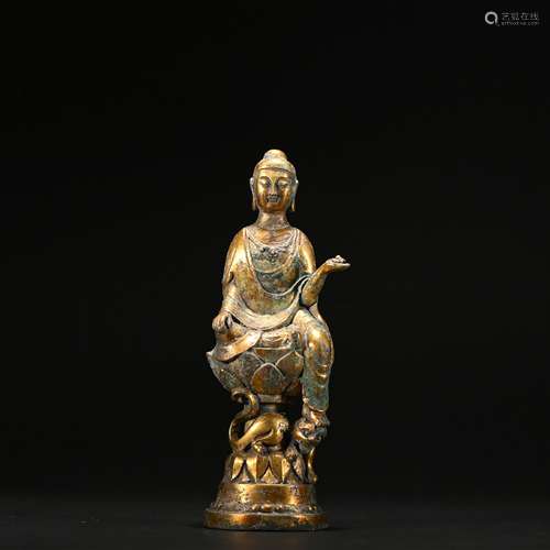 A gilt-bronze statue of Guanyin