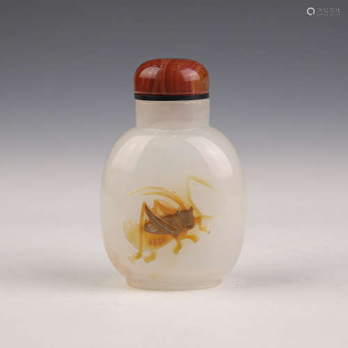 A Carved Cricket Agate Snuff Bottle