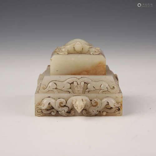 A White Jade Set of Seal