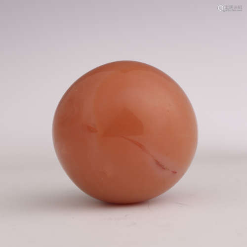 An Orange Red Agate Ball