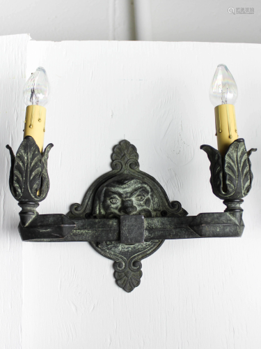 A Pair of Figural Verdigris Double Candle Sconces