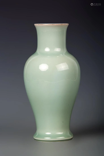 A CELADON PORCELAIN GUANYIN VASE