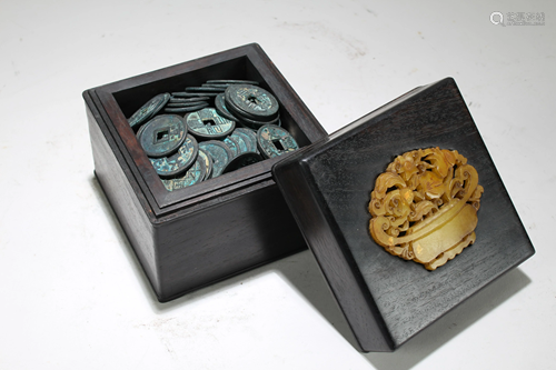 A Chinese Coin-filled Black Lidded Wooden Box