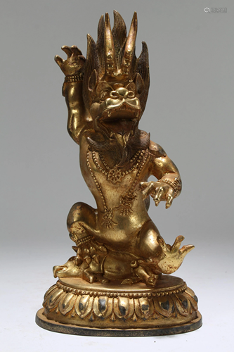 A Tibetan Vividly-detailed Gilt Fortune Buddha Statue