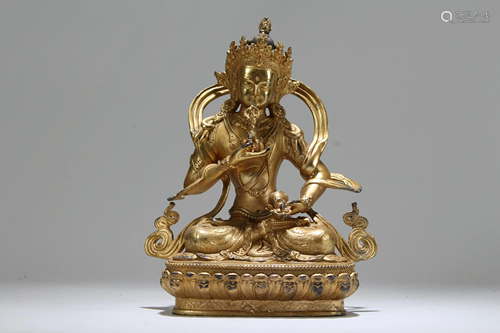 A Chinese Gilt Fortune Religious Buddha Statue