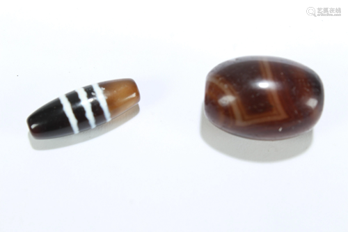 Two Tibetan Dzi Beads