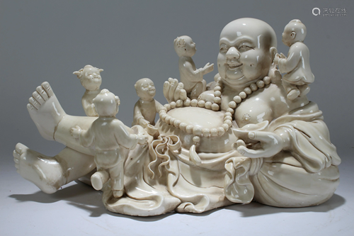 A Chinese White-coding Buddha Fortune Statue